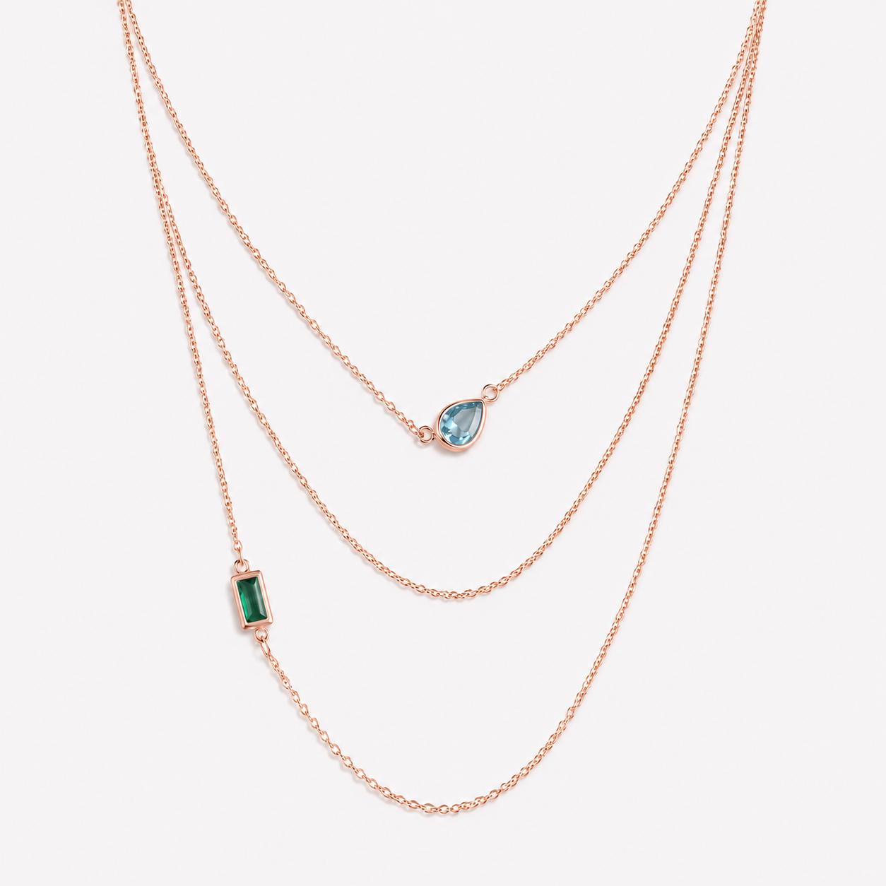 Bonheur Jewelry Ambroise 3 Strand Necklace, gold/rhodium finish, green crystal, necklace, styled view.