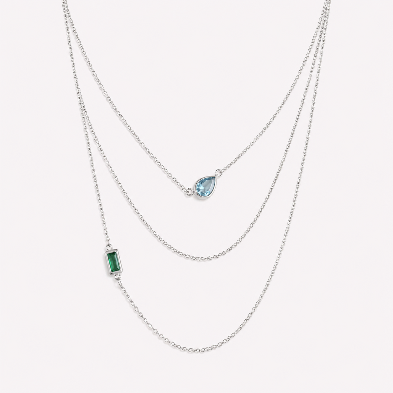 Bonheur Jewelry Ambroise 3 Strand Necklace, gold/rhodium finish, green crystal, necklace, styled view.