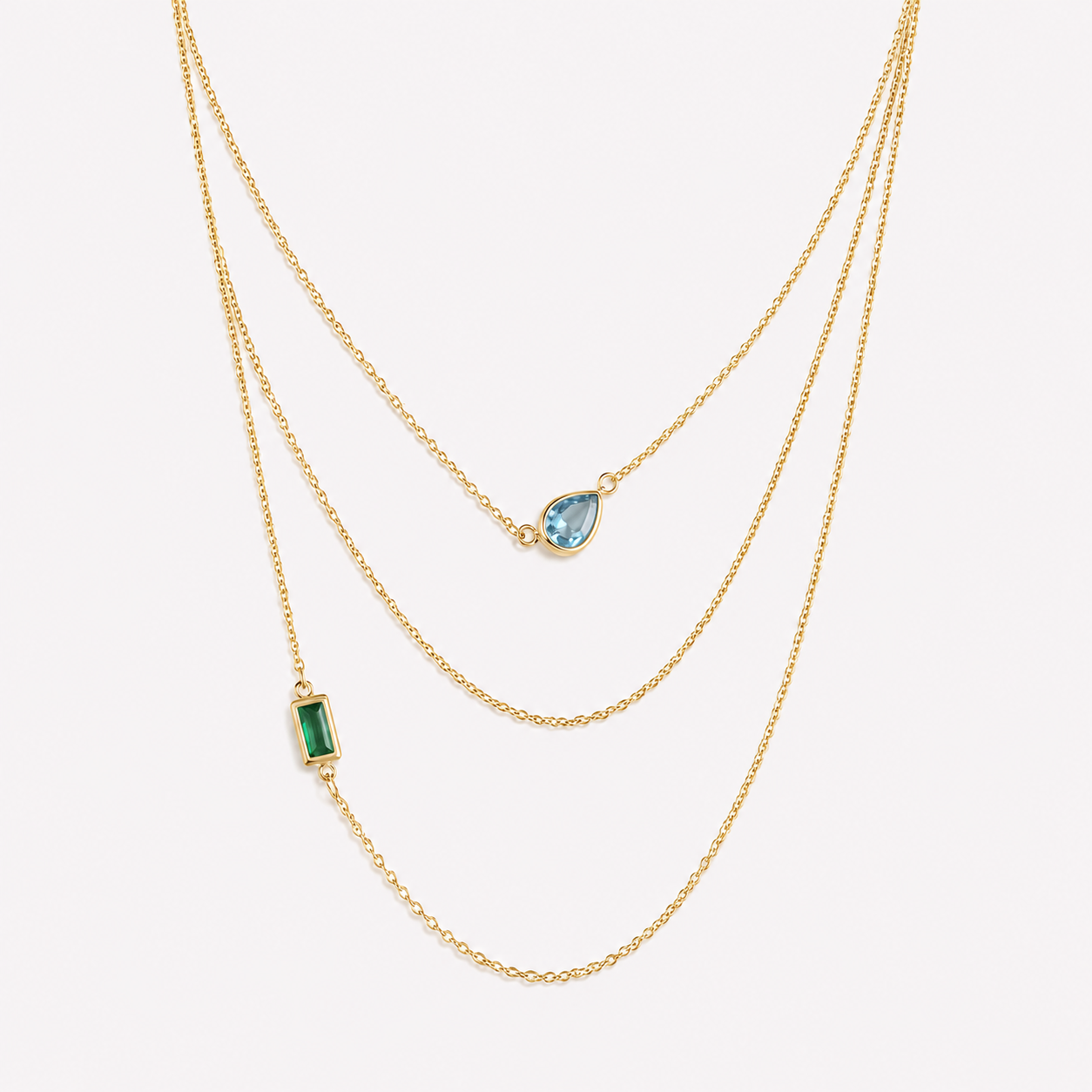Bonheur Jewelry Ambroise 3 Strand Necklace, gold/rhodium finish, green crystal, necklace, styled view.