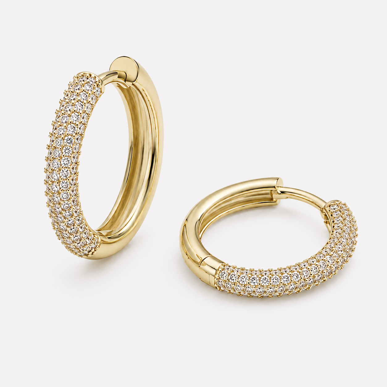 Bonheur Jewelry Coco Huggy Hoops, 14k gold or rhodium finish, 0.20 ct diamonds, hoop earrings, front view.