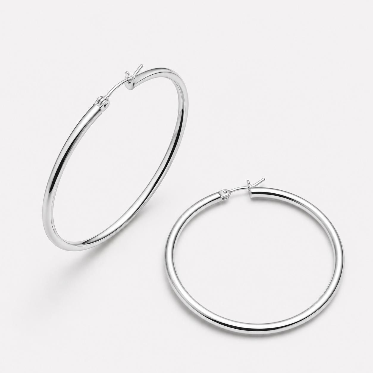 Bonheur Jewelry Margot Lightweight Hoops, gold, rose gold, or rhodium finish, polished metal, hoop earrings, front view.