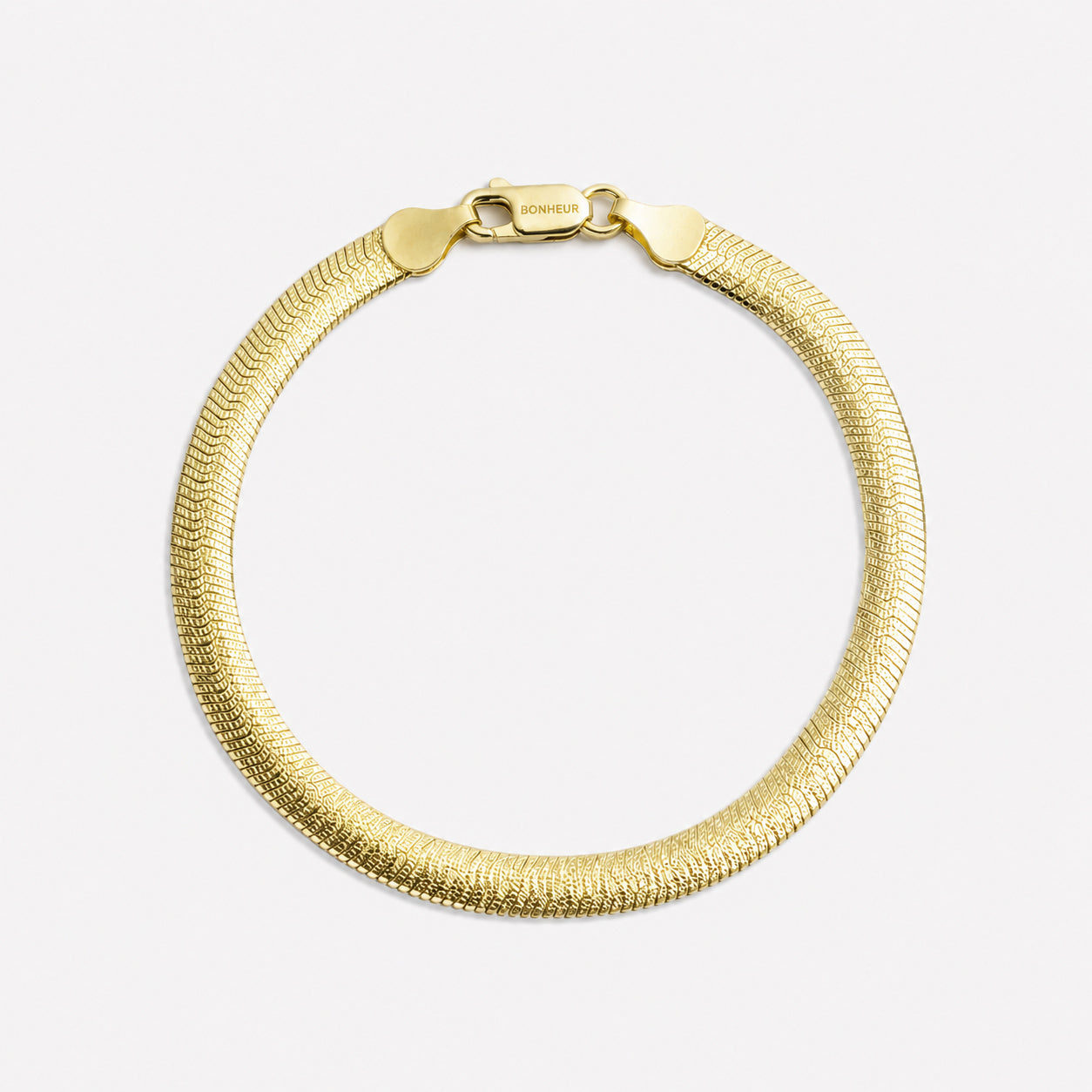 Bonheur Jewelry Angelique Gold Diamond Cut Bracelet, 18k gold plated finish, polished metal, bracelet, front view.