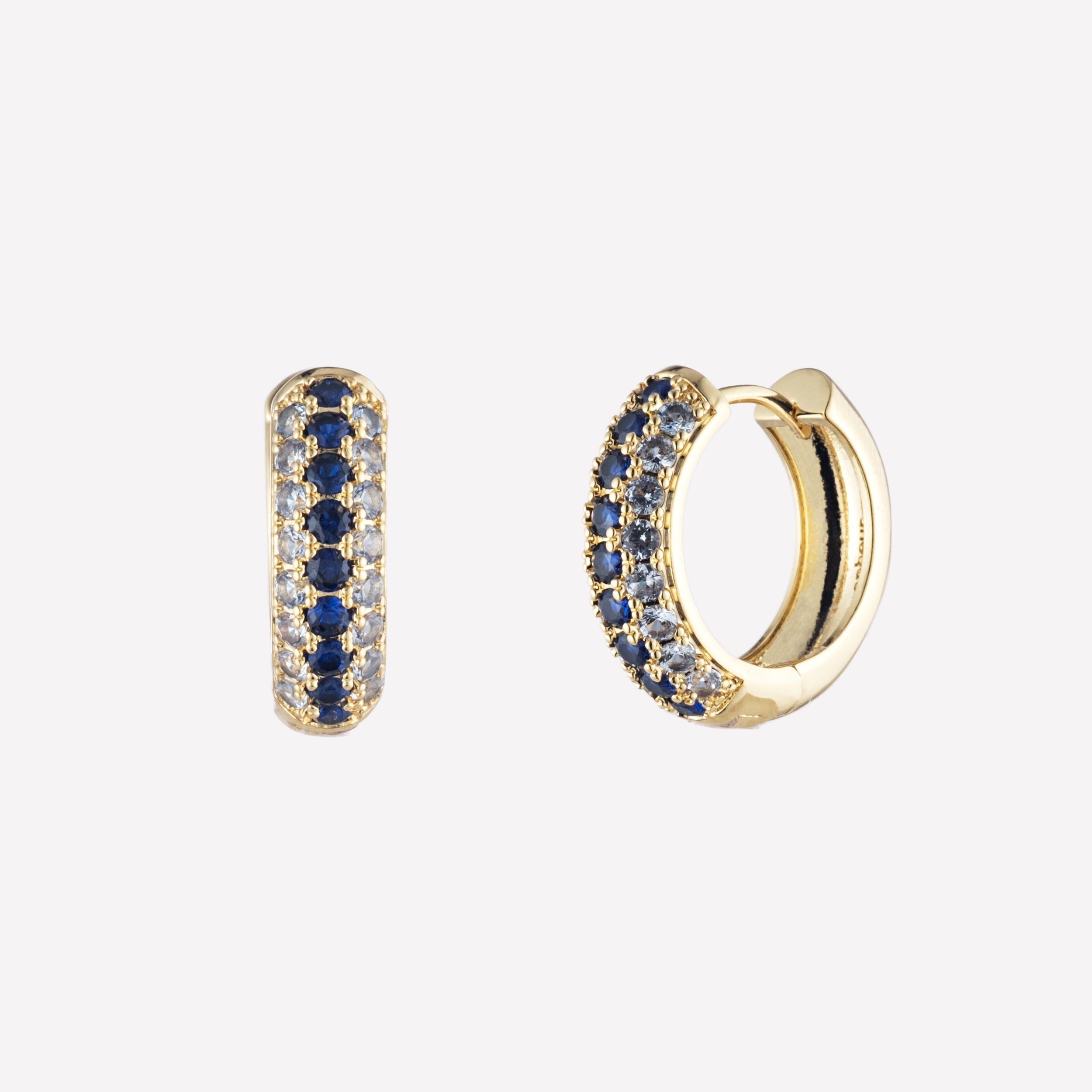 Bonheur Jewelry Addison Pave Huggie Hoop Earrings, gold/rhodium finish, blue crystal, hoop earrings, front view.