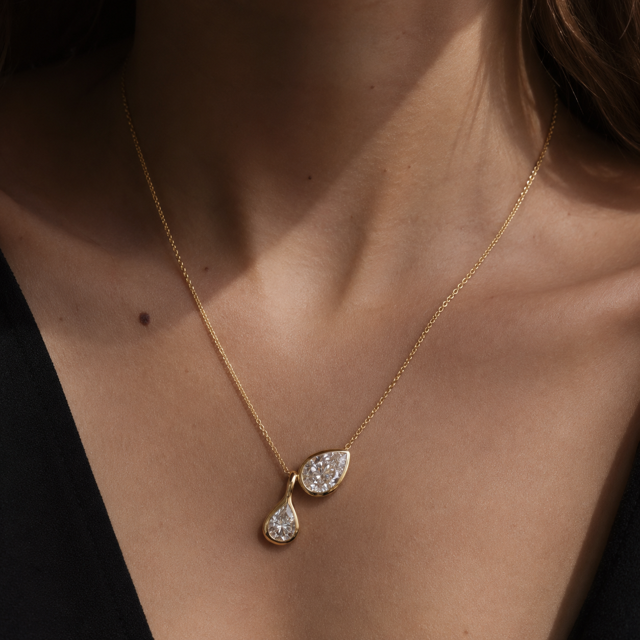 Bonheur Jewelry Bernadette Pear Shaped Necklace in rhodium plated silver with pear Swarovski crystal, front view.