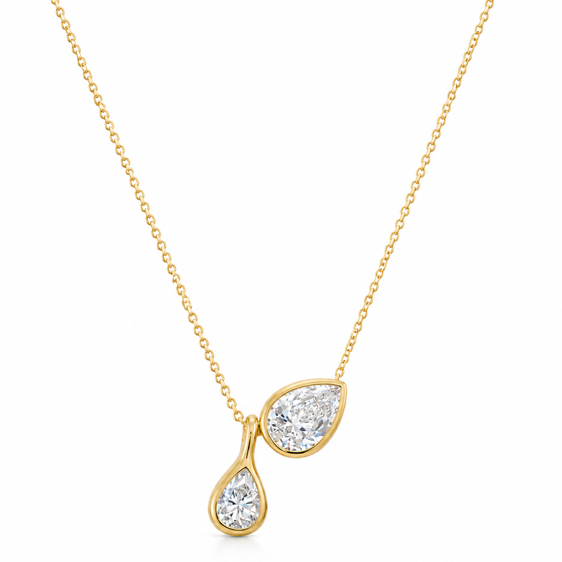 Bonheur Jewelry Bernadette Pear Shaped Necklace with two pear-cut Swarovski crystals, styled detail.