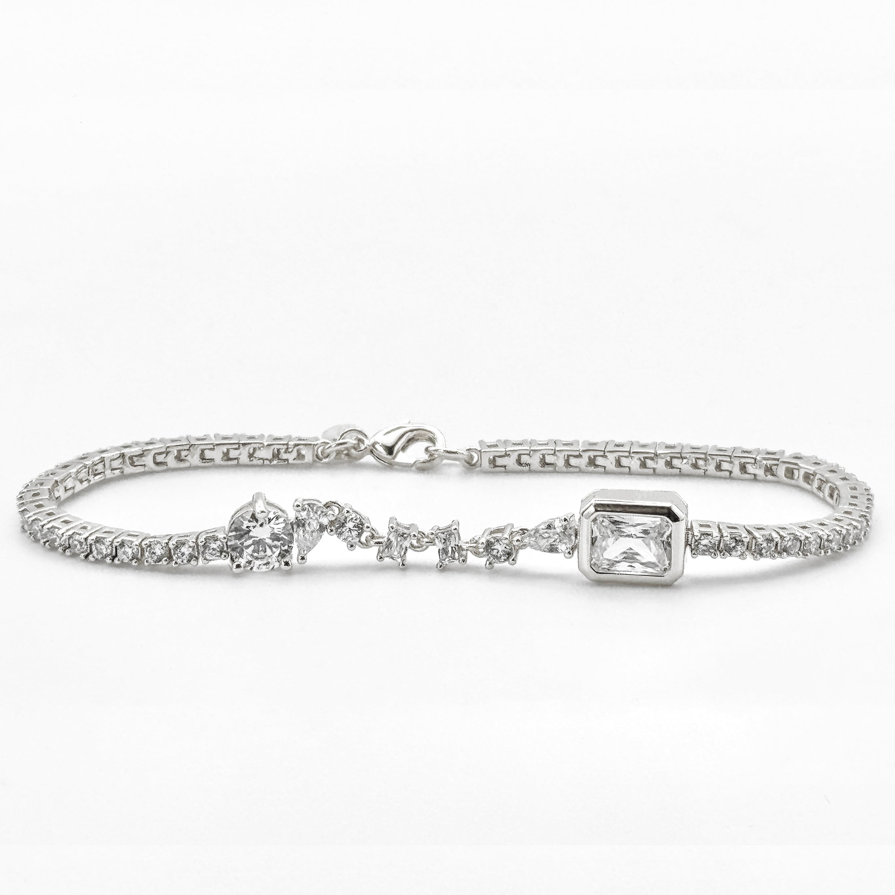 Bonheur Jewelry Celeste Clear Crystal Bracelet, clear Swarovski crystals in a mixed cut tennis bracelet, gold or rhodium finish, detail view.