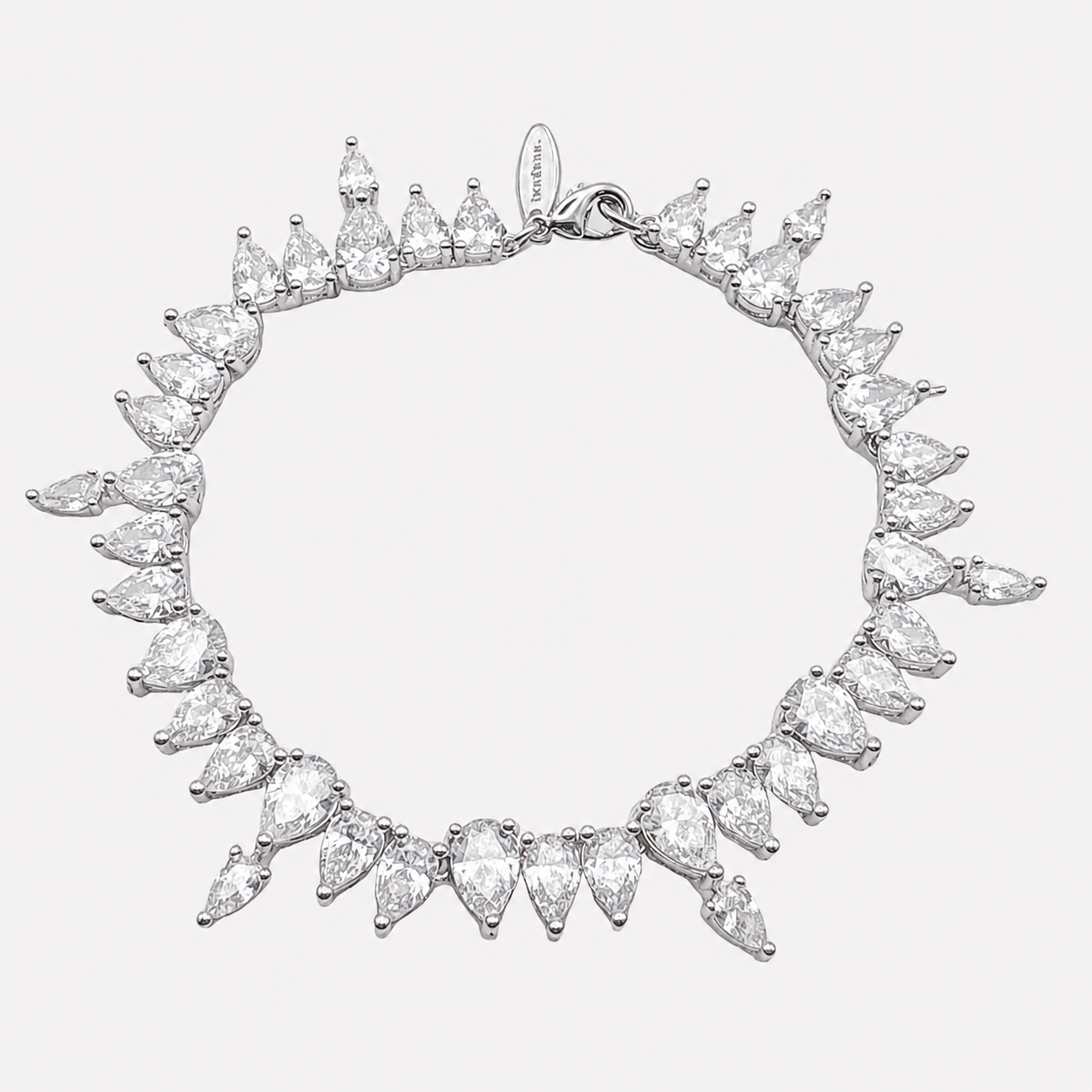 Bonheur Jewelry Roxane Pear Tennis Bracelet, pear cut tennis bracelet with white Swarovski crystals in gold or rhodium finish, front view.