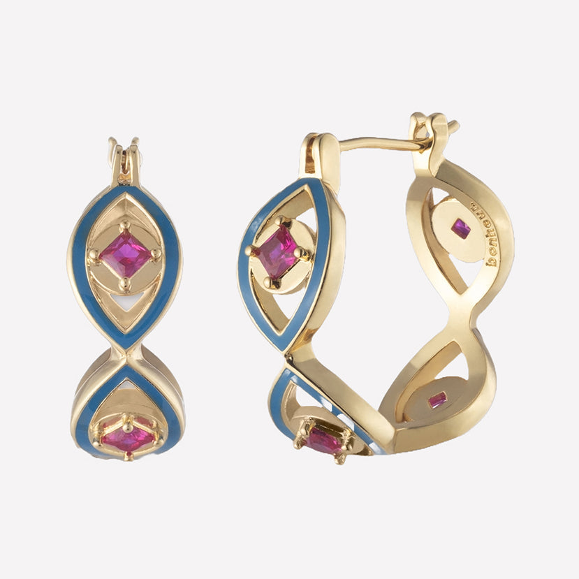 Shiva blue enamel hoop earrings with gold plated hoops and Swarovski crystal evil eye centers.